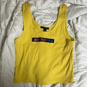 Yellow graphic tank top Size: L